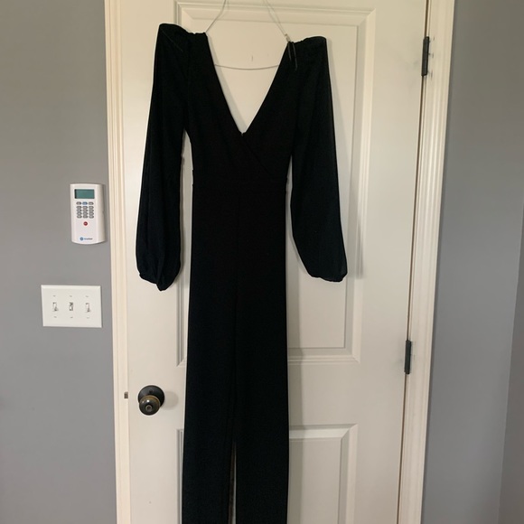 Black one piece jumpsuit. V neck sheer long sleeve - Picture 1 of 1